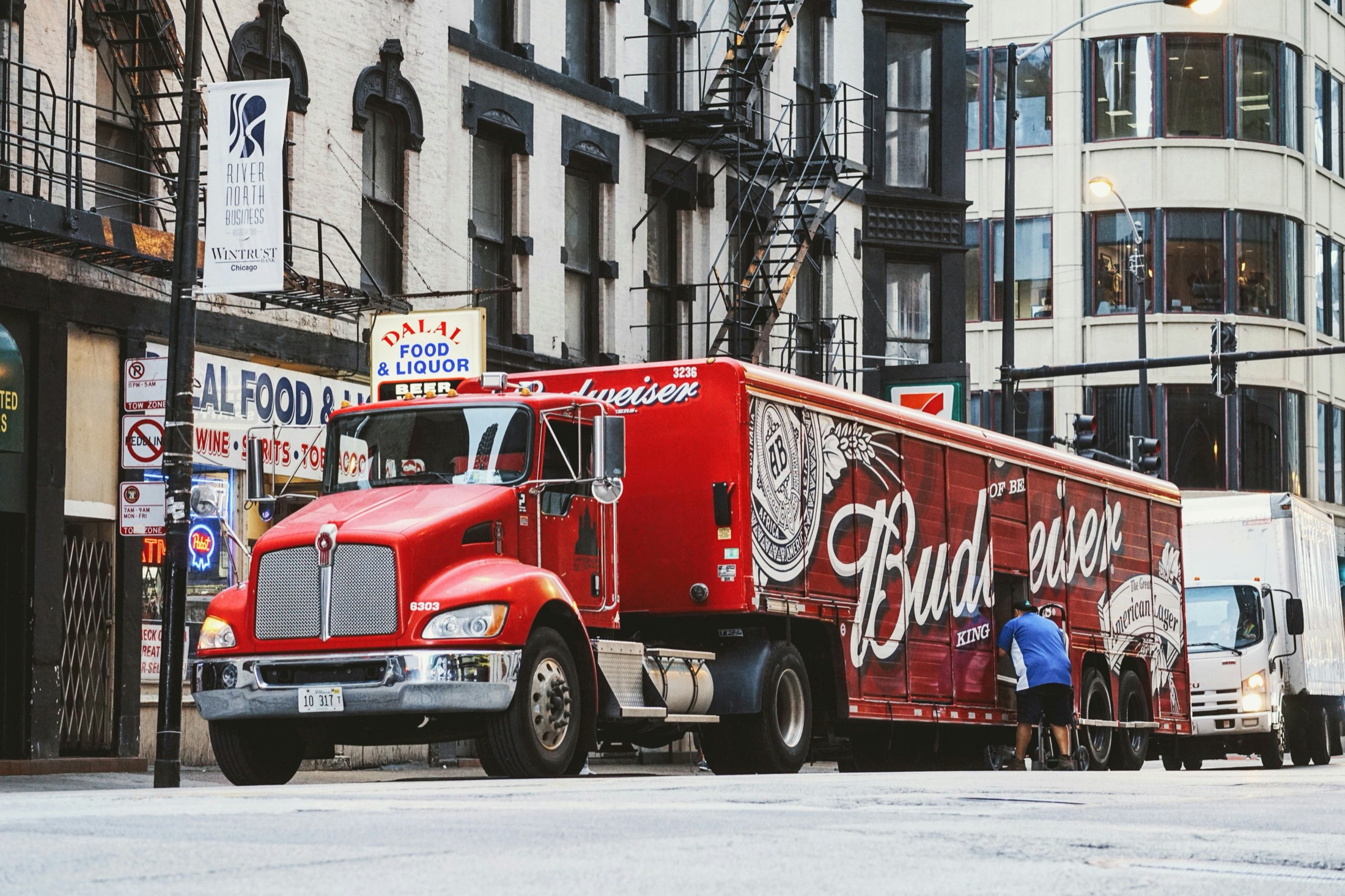A Budweiser delivery truck outside a liquor store in Chicago